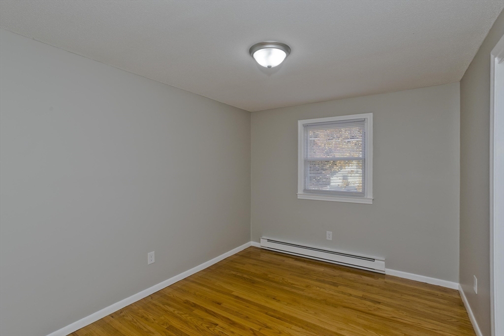 35 Ludlow Road South Hadley, MA 01075 - Photo 26 of 34 a view of a room with wooden floor and a window