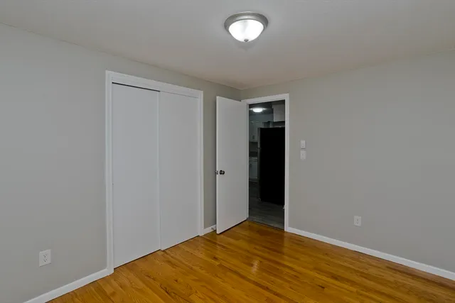 a view of an empty room with a projector