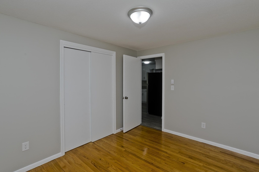 35 Ludlow Road South Hadley, MA 01075 - Photo 27 of 34 a view of empty room with wooden floor