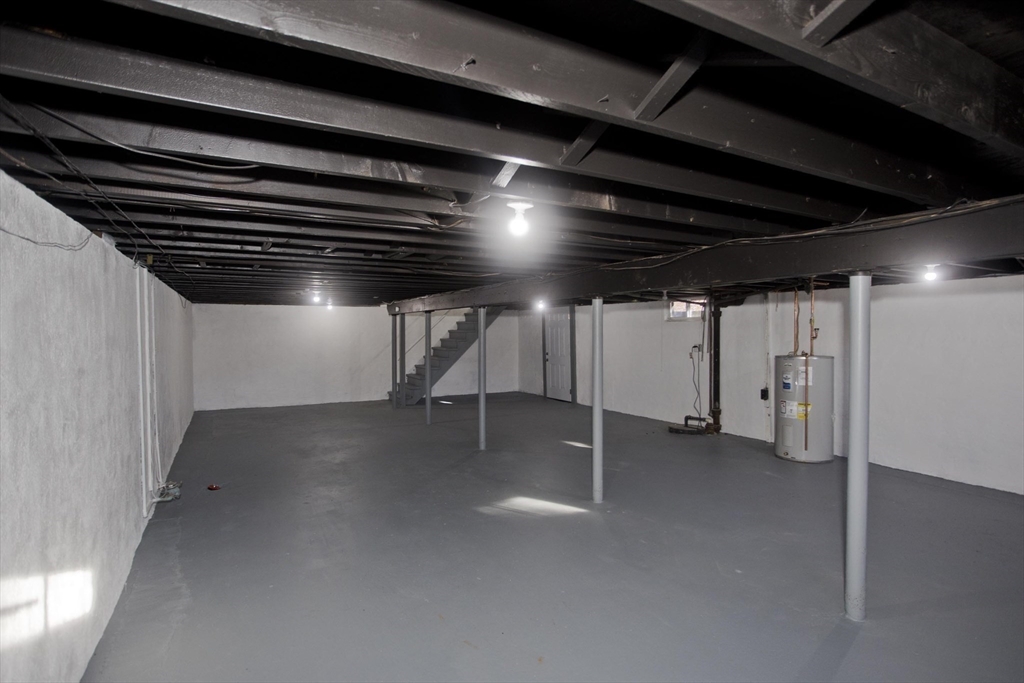 35 Ludlow Road South Hadley, MA 01075 - Photo 31 of 34 a view of an empty room with a projector