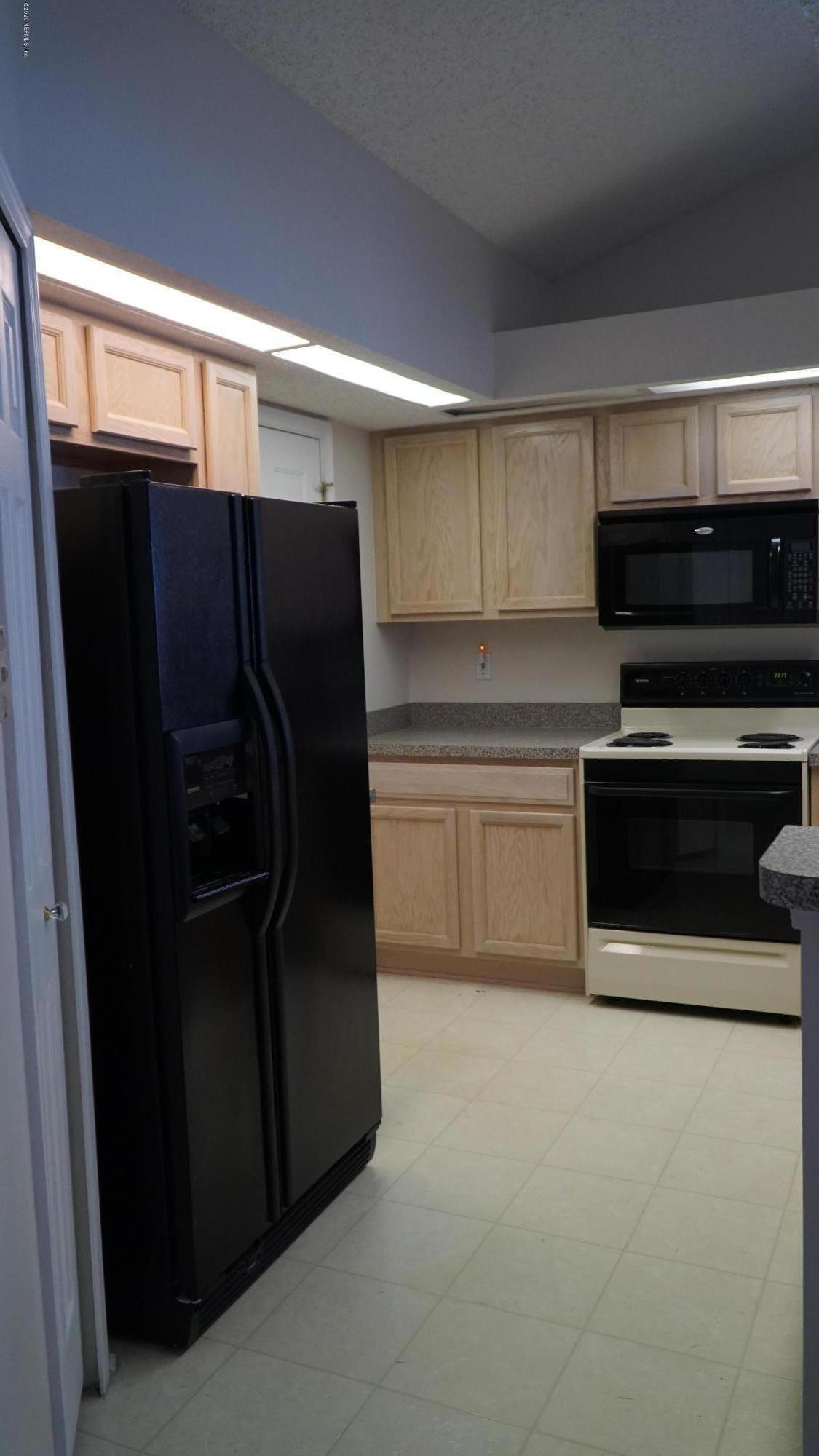 1144 Creeks Ridge Road Jacksonville, FL 32225 - Photo 12 of 31 Fridge and Stove