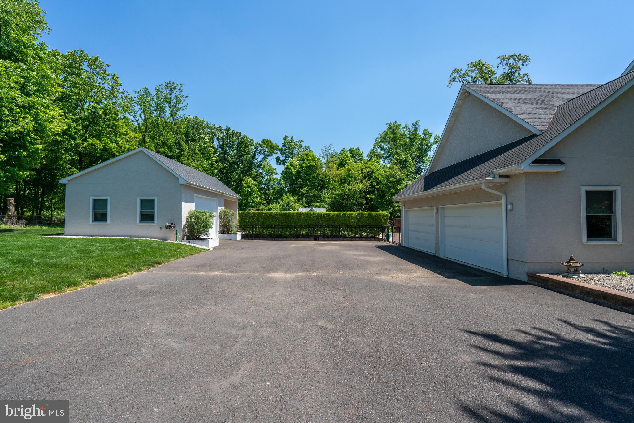 389 Eagle Road Newtown, PA 18940 - Photo 45 of 47 WIDE DRIVEWAY and 6 CAR Garage space.