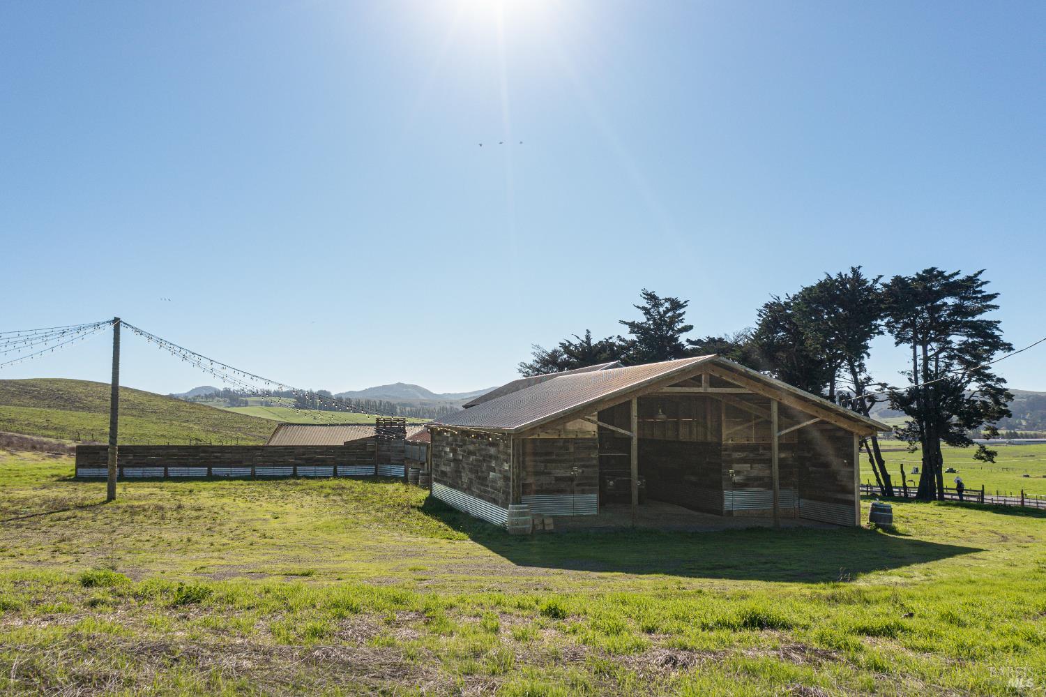 3150 Pepper Road Petaluma, CA 94952 - Photo 66 of 85 Back bay of the barn showing the large storage rooms of either side. Plenty of room for all your farm equipment, toys & holiday decorations.