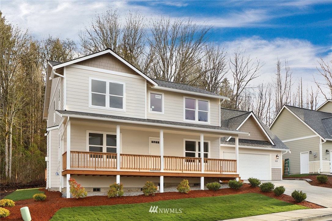 319 Whitetail Loop Blaine, WA 98230 - Photo 2 of 40 a front view of a house with a yard