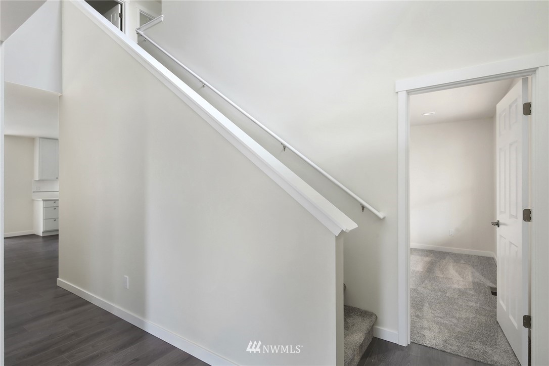 319 Whitetail Loop Blaine, WA 98230 - Photo 21 of 40 a view of hallway with stairs