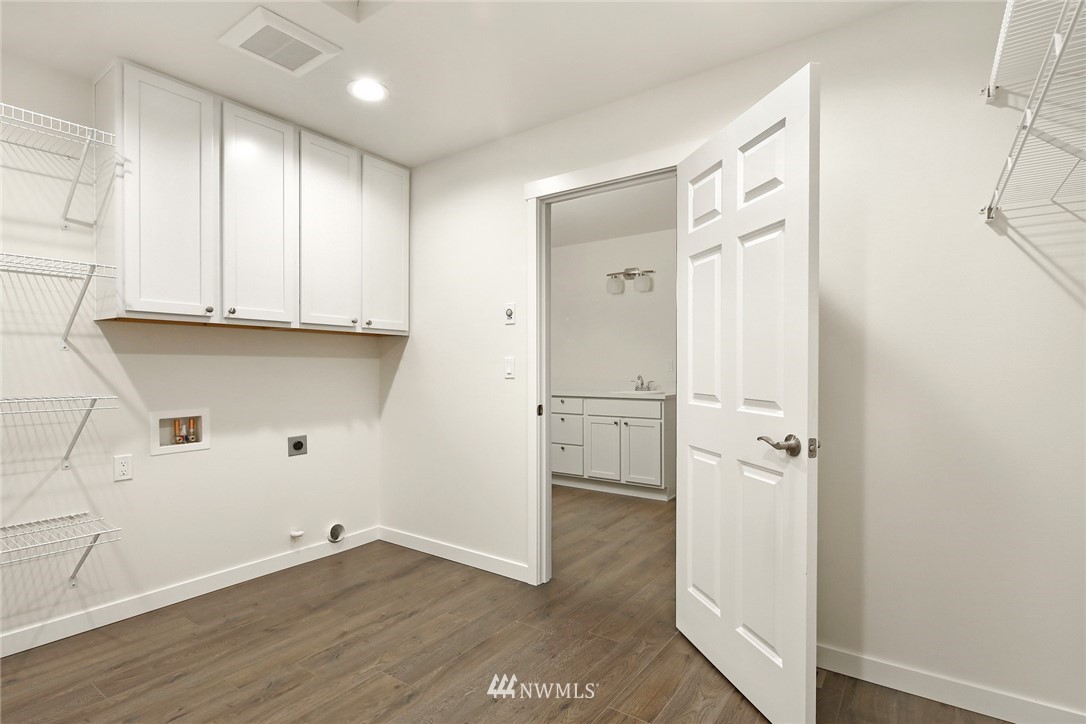 319 Whitetail Loop Blaine, WA 98230 - Photo 24 of 40 a view of cabinets and wooden floor