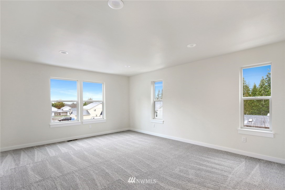 319 Whitetail Loop Blaine, WA 98230 - Photo 27 of 40 a view of an empty room with a window