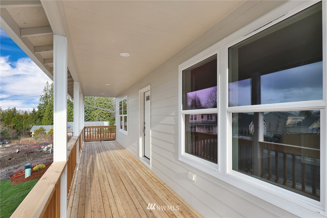 319 Whitetail Loop Blaine, WA 98230 - Photo 4 of 40 a view of balcony with wooden floor and fence