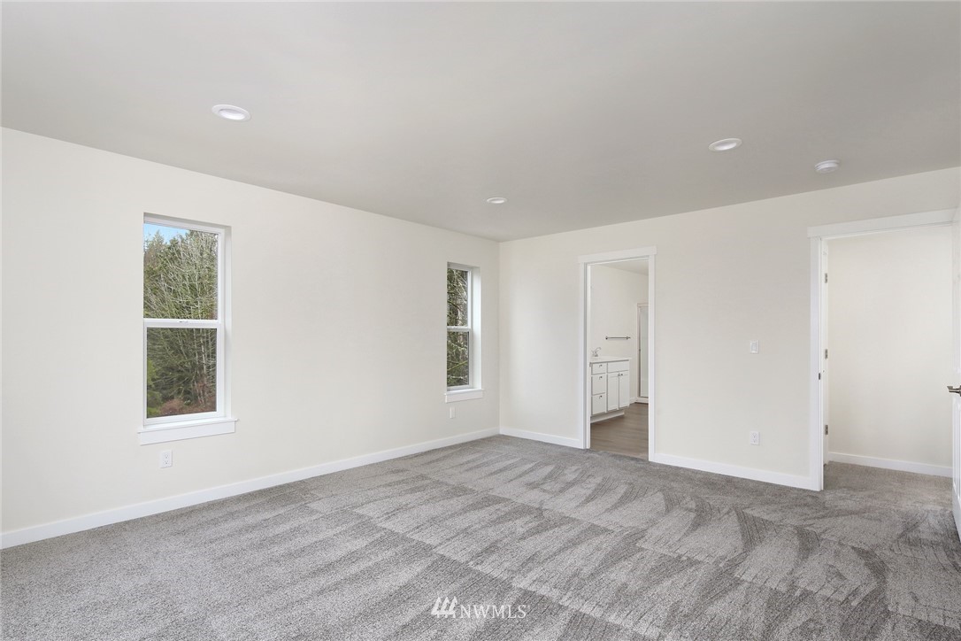 319 Whitetail Loop Blaine, WA 98230 - Photo 32 of 40 a view of an empty room with a window