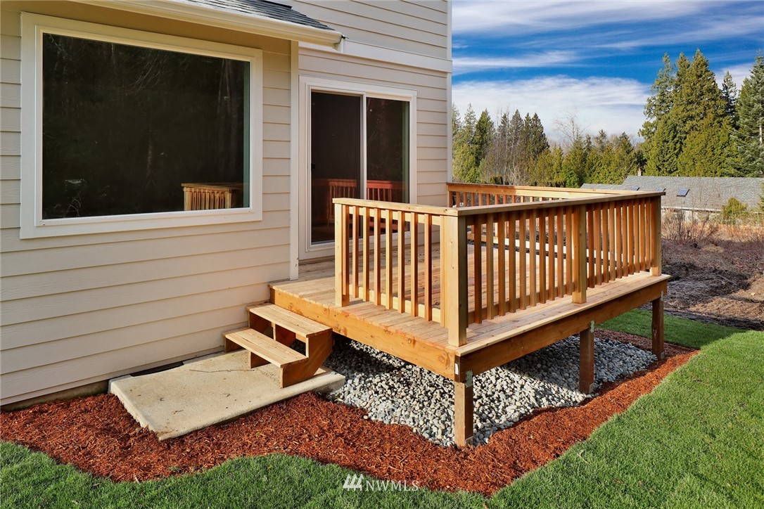319 Whitetail Loop Blaine, WA 98230 - Photo 37 of 40 a view of a two chairs in the patio