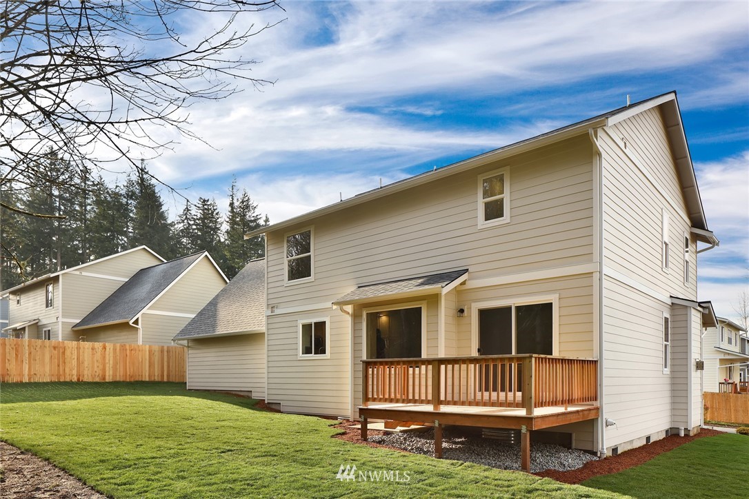 319 Whitetail Loop Blaine, WA 98230 - Photo 38 of 40 a front view of a house with a yard