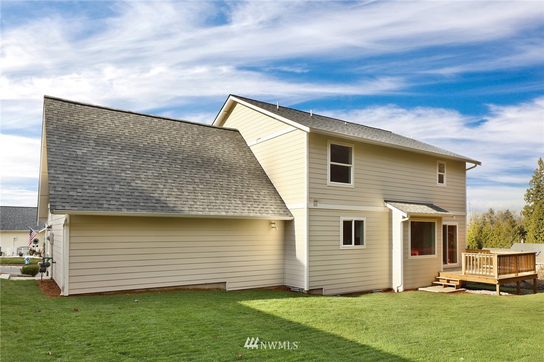 319 Whitetail Loop Blaine, WA 98230 - Photo 39 of 40 a view of a house with a yard