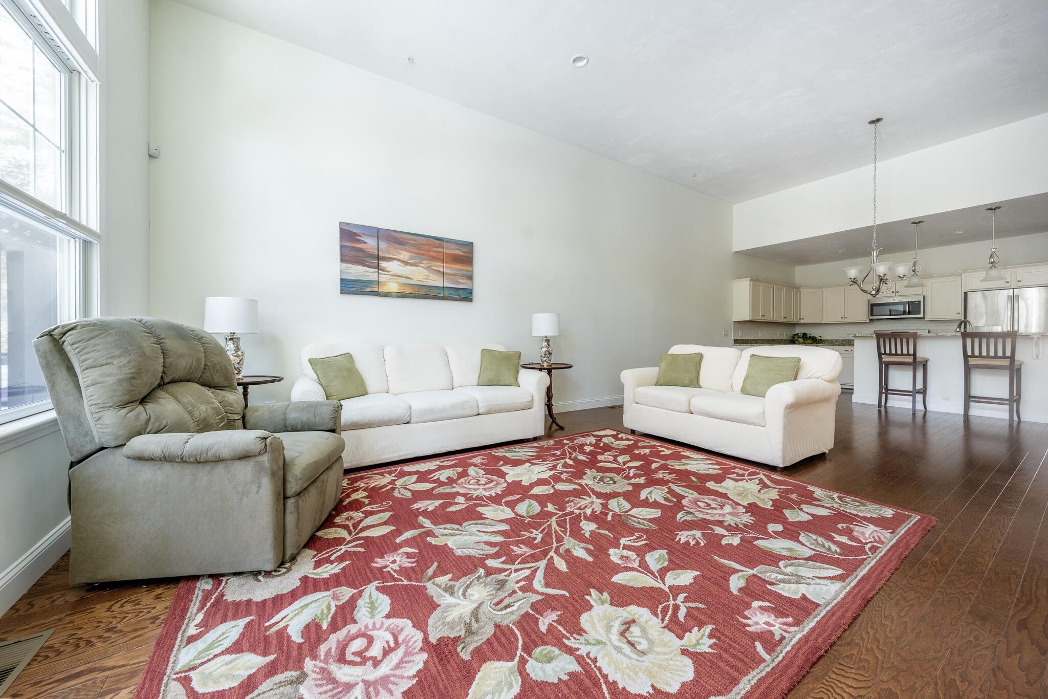 22 Grey Hawk Drive, Unit 645 Mashpee, MA 02649 - Photo 7 of 36 living/dining/kitchen