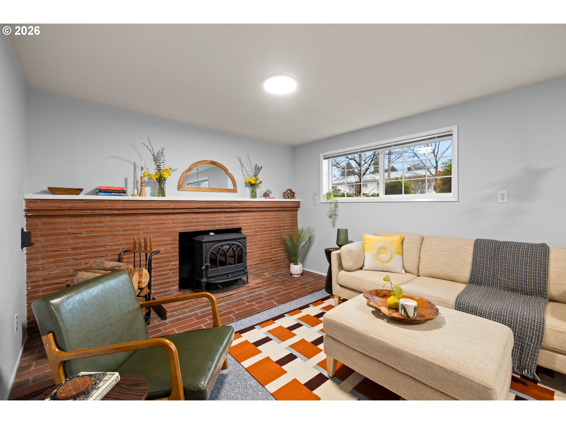 1744 Northeast 153rd Place Portland, OR 97230 - Photo 20 of 33 a living room with furniture and a fireplace