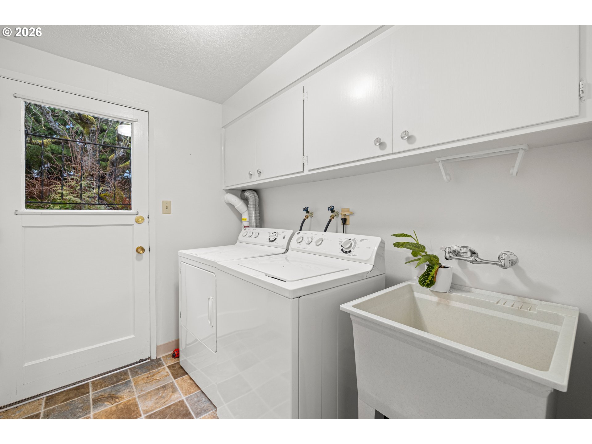 1744 Northeast 153rd Place Portland, OR 97230 - Photo 24 of 33 a utility room with dryer and washer