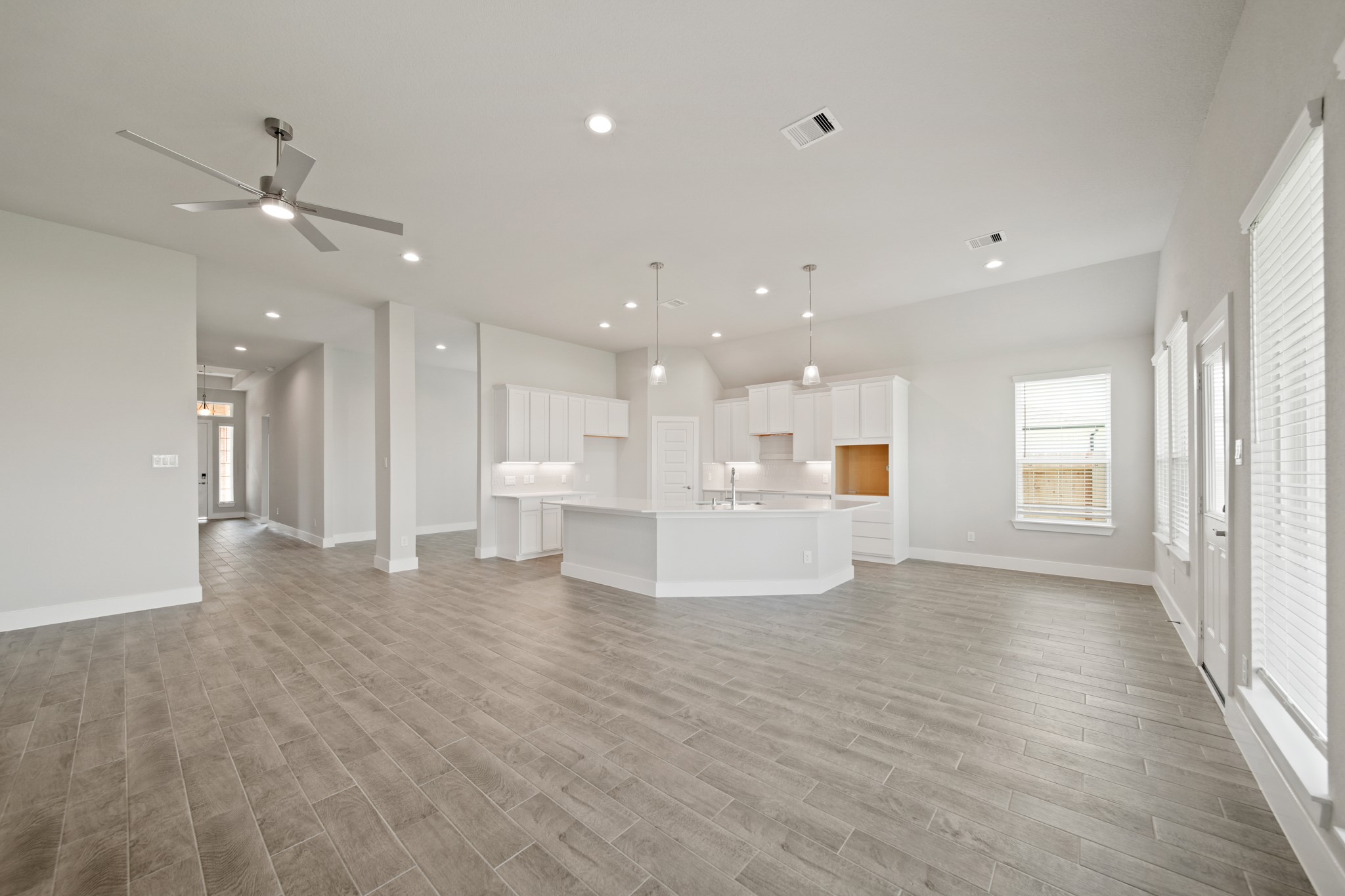 405 Hampton Edge Lane Waller, TX 77484 - Photo 13 of 45 a view of an empty room and kitchen view