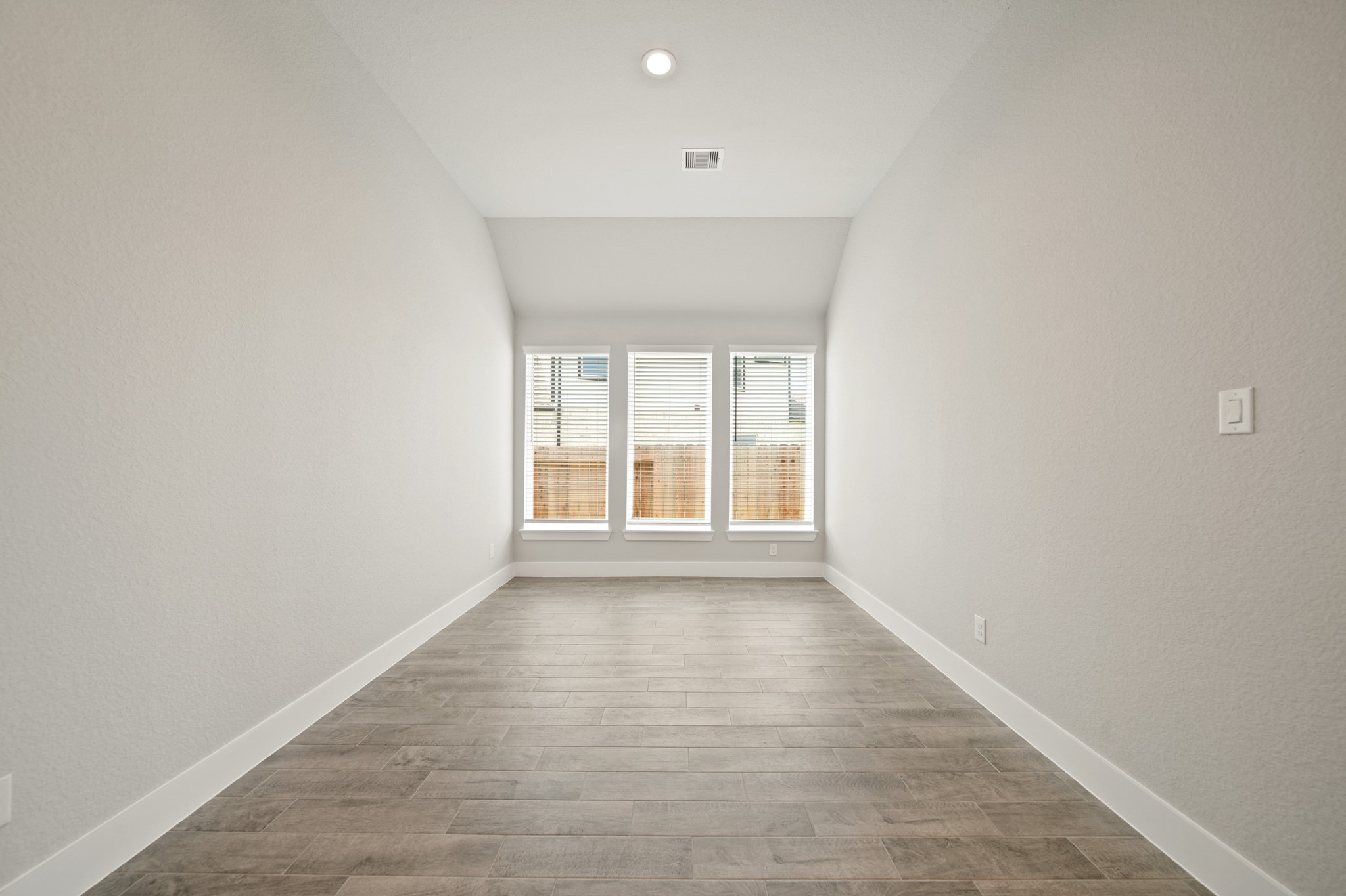 405 Hampton Edge Lane Waller, TX 77484 - Photo 15 of 45 a view of an empty room with a window