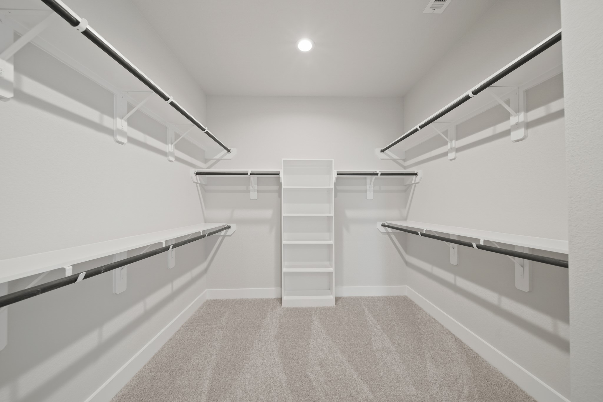 405 Hampton Edge Lane Waller, TX 77484 - Photo 19 of 45 a view of an empty walk in closet