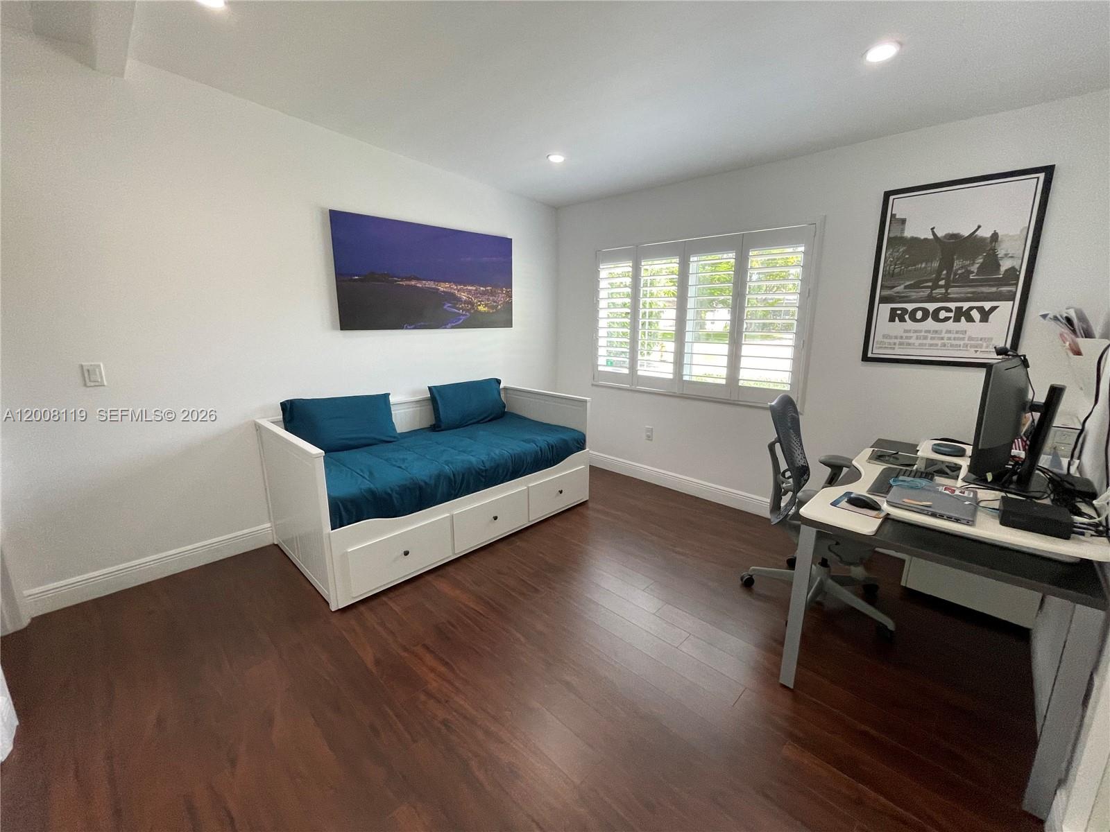 4161 Southwest 102nd Avenue Miami, FL 33165 - Photo 23 of 33 a living room with furniture and wooden floor