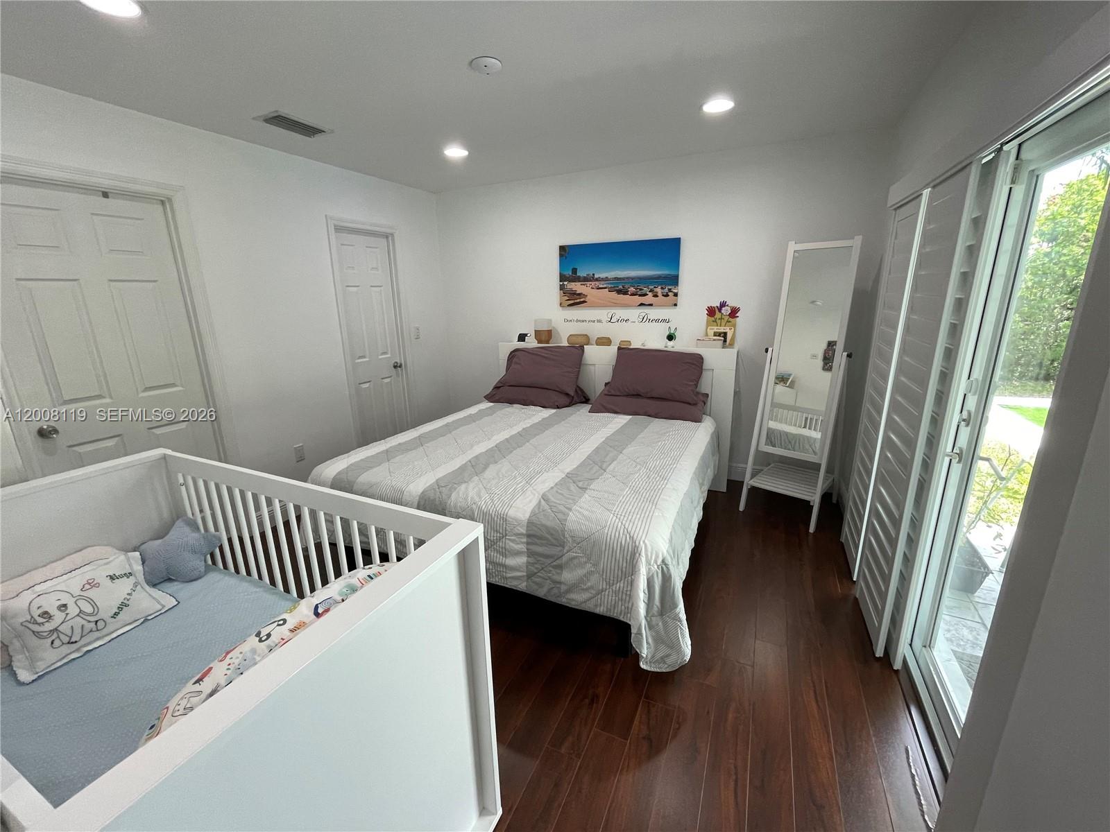 4161 Southwest 102nd Avenue Miami, FL 33165 - Photo 26 of 33 a bedroom with furniture and a window
