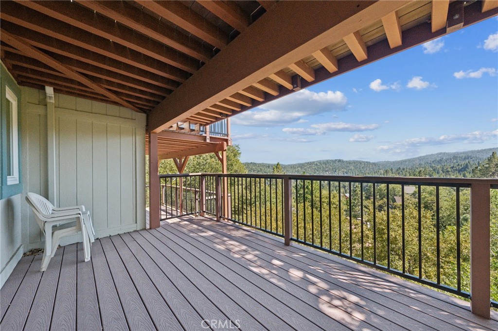 845 Sonoma Drive Lake Arrowhead, CA 92352 - Photo 11 of 49 a view of a balcony with wooden floor