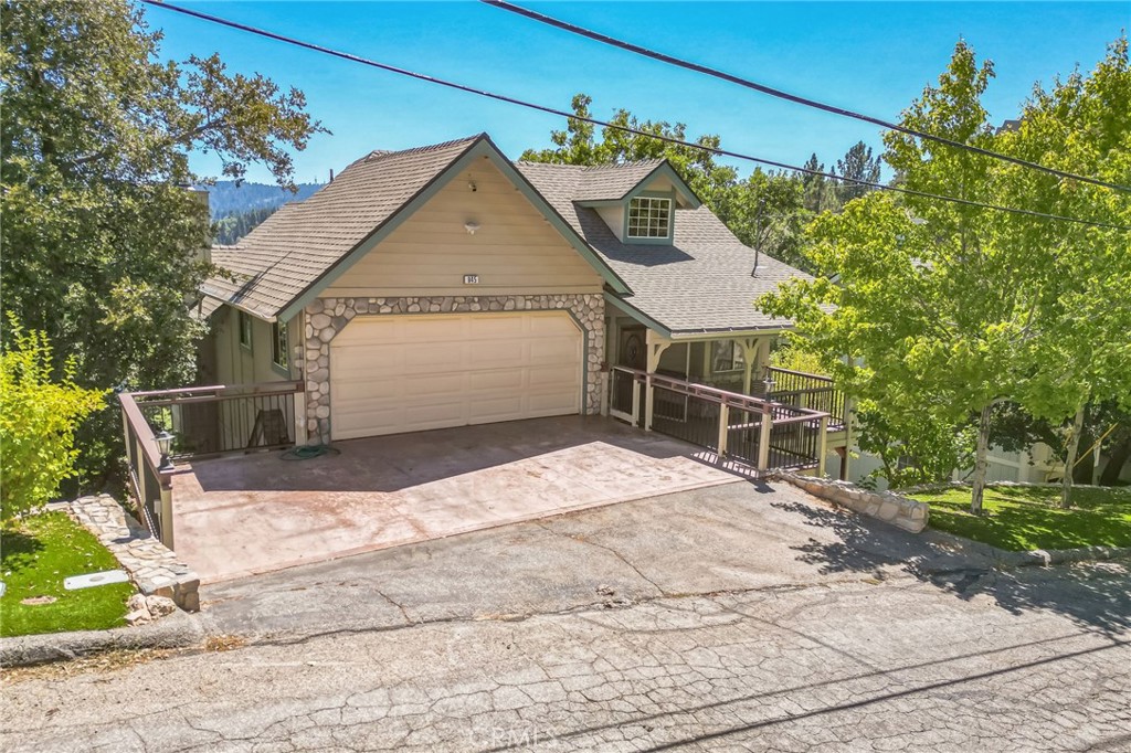 845 Sonoma Drive Lake Arrowhead, CA 92352 - Photo 2 of 49 a view of a house with a garage