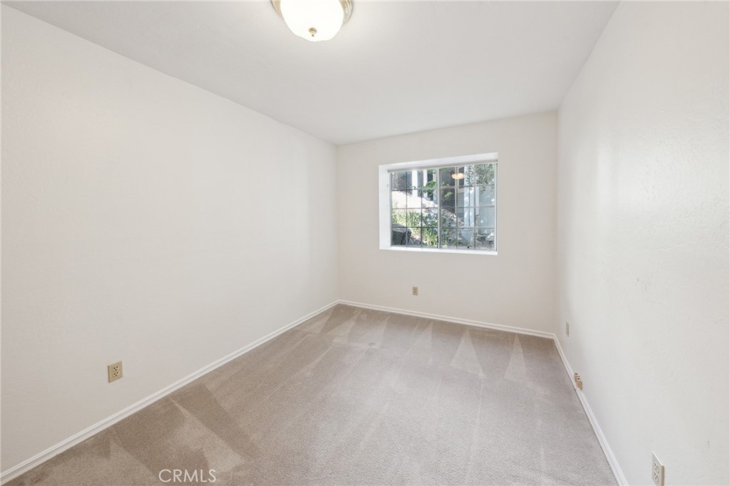 845 Sonoma Drive Lake Arrowhead, CA 92352 - Photo 25 of 49 an empty room with windows