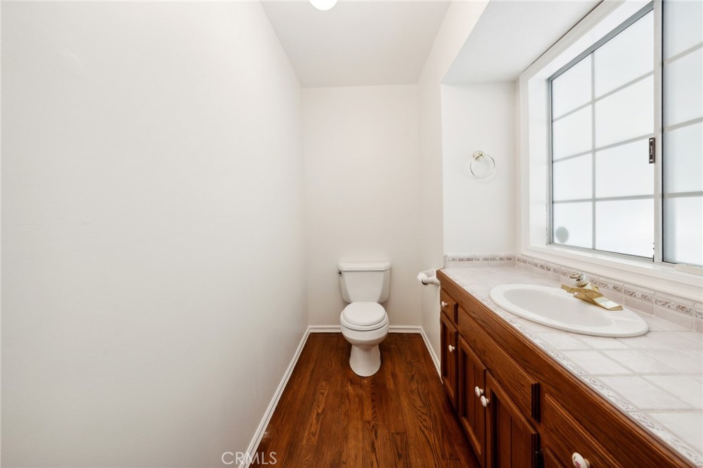845 Sonoma Drive Lake Arrowhead, CA 92352 - Photo 28 of 49 a bathroom with a sink a toilet and a window