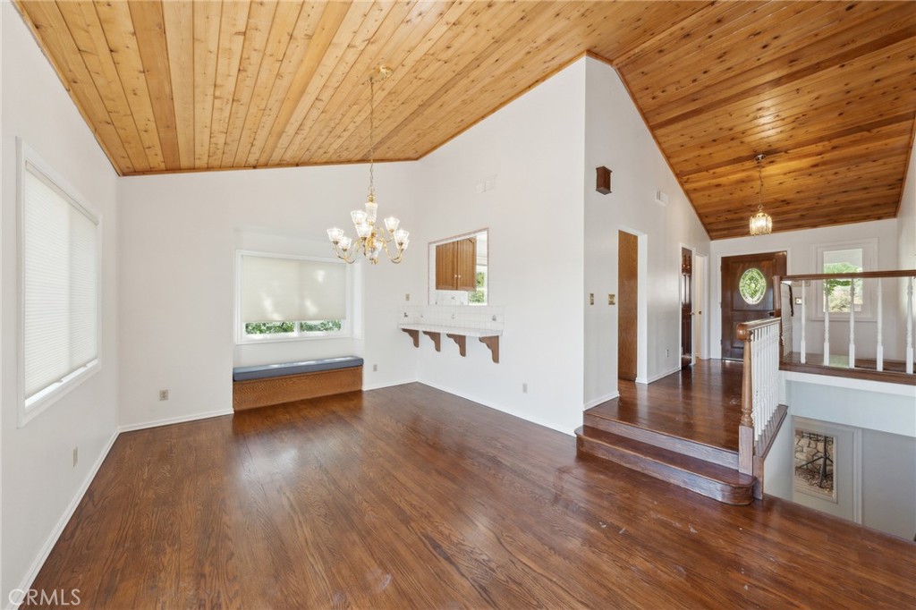 845 Sonoma Drive Lake Arrowhead, CA 92352 - Photo 7 of 49 a view of livingroom with furniture wooden floor and front door