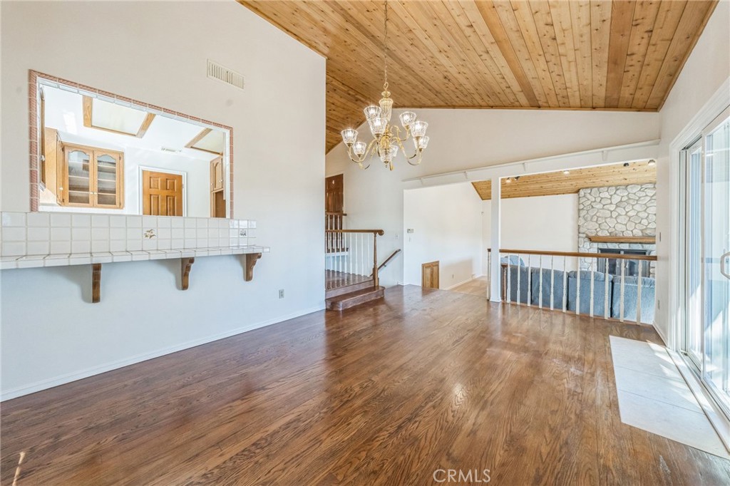 845 Sonoma Drive Lake Arrowhead, CA 92352 - Photo 8 of 49 a view of a room with wooden floor and staircase
