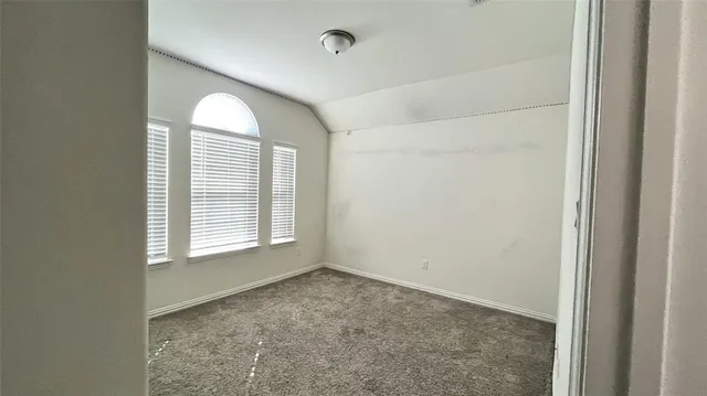 a bathroom with a double vanity sink and mirror