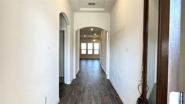 a view of entryway with wooden floor