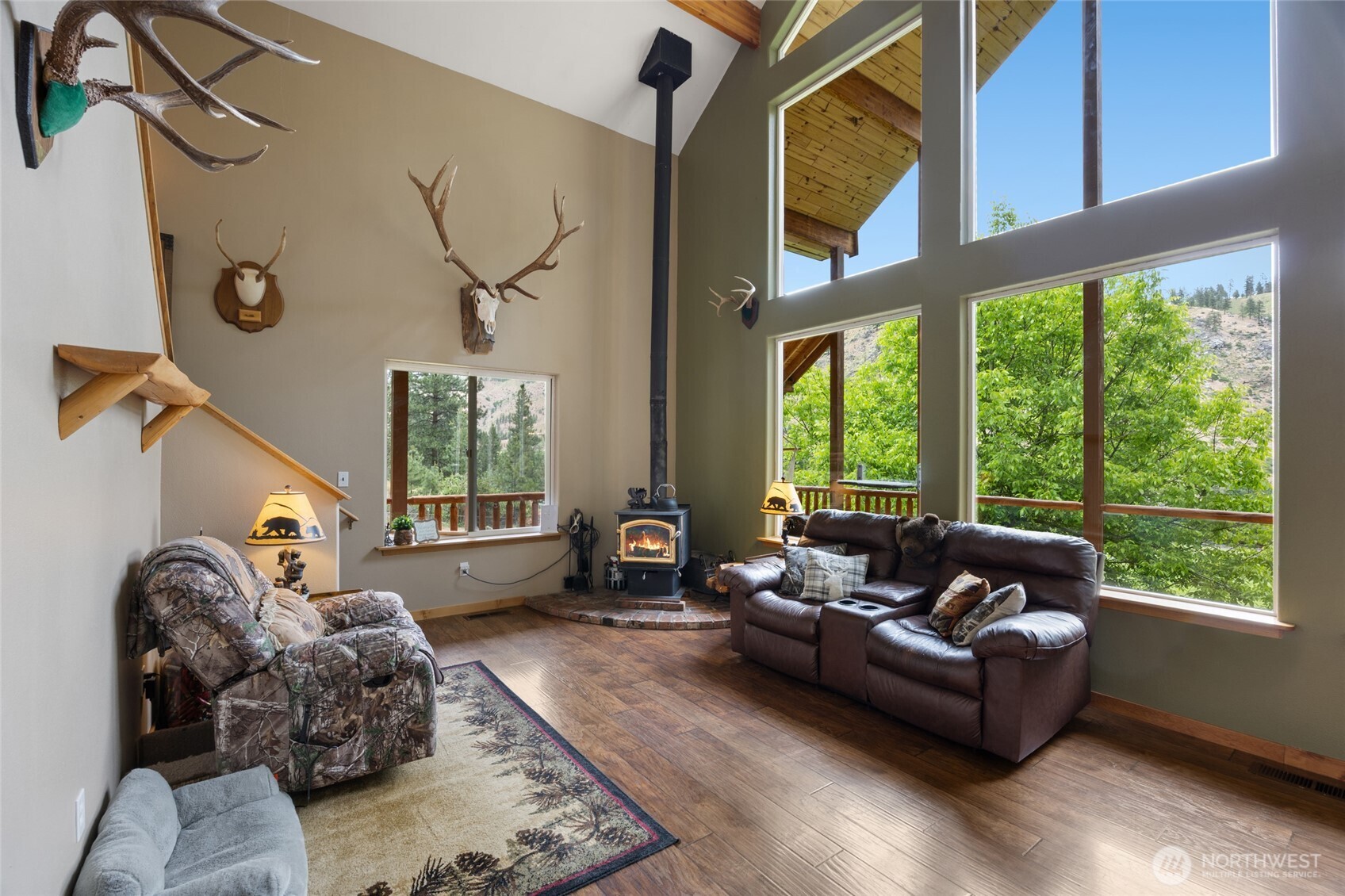 11125 Entiat River Road Entiat, WA 98822 - Photo 17 of 40 a living room with furniture and a large window
