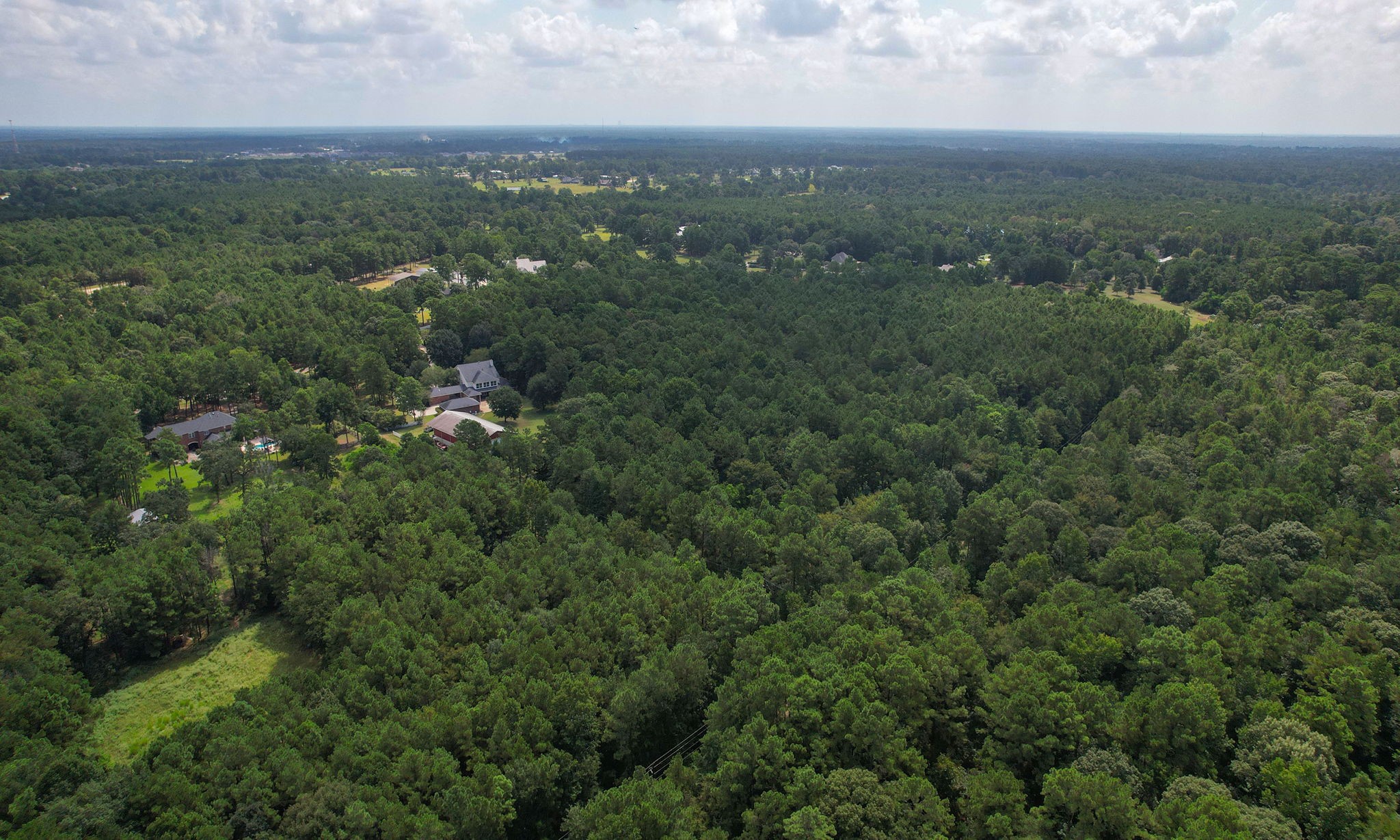 0 Whispering Meadow Magnolia, TX 77355 - Photo 11 of 14 an aerial view of multiple house