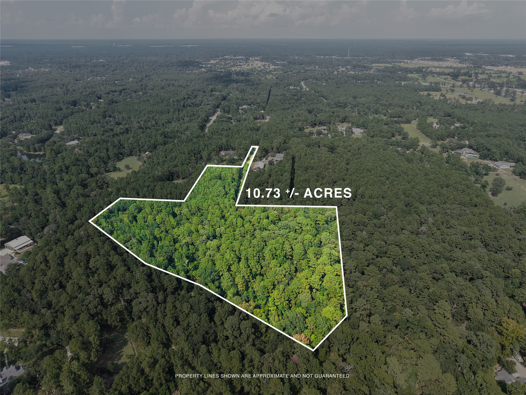 0 Whispering Meadow Magnolia, TX 77355 - Photo 4 of 14 a sign that is sitting on a brick wall