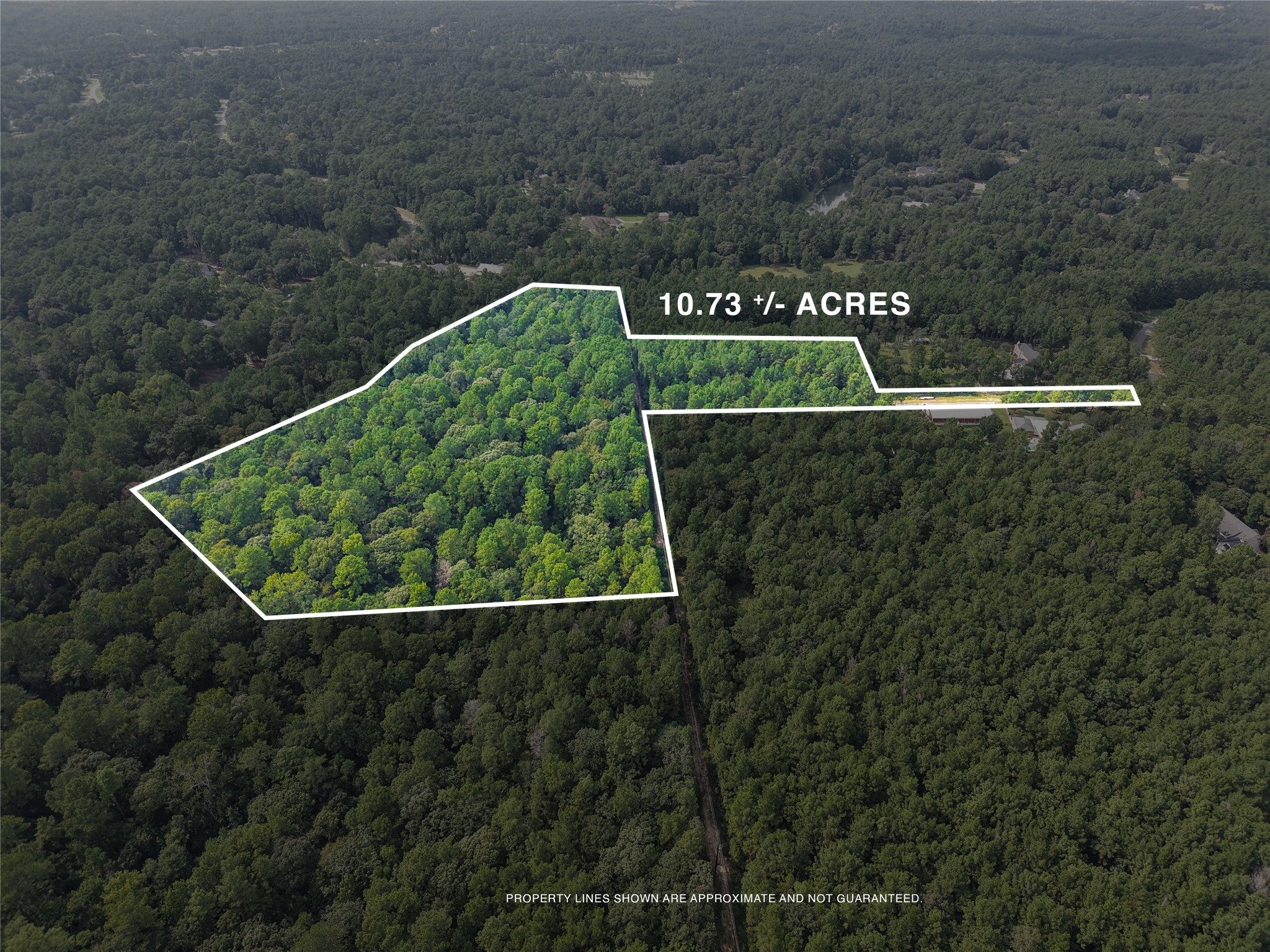 0 Whispering Meadow Magnolia, TX 77355 - Photo 5 of 14 a view of a sign in a park