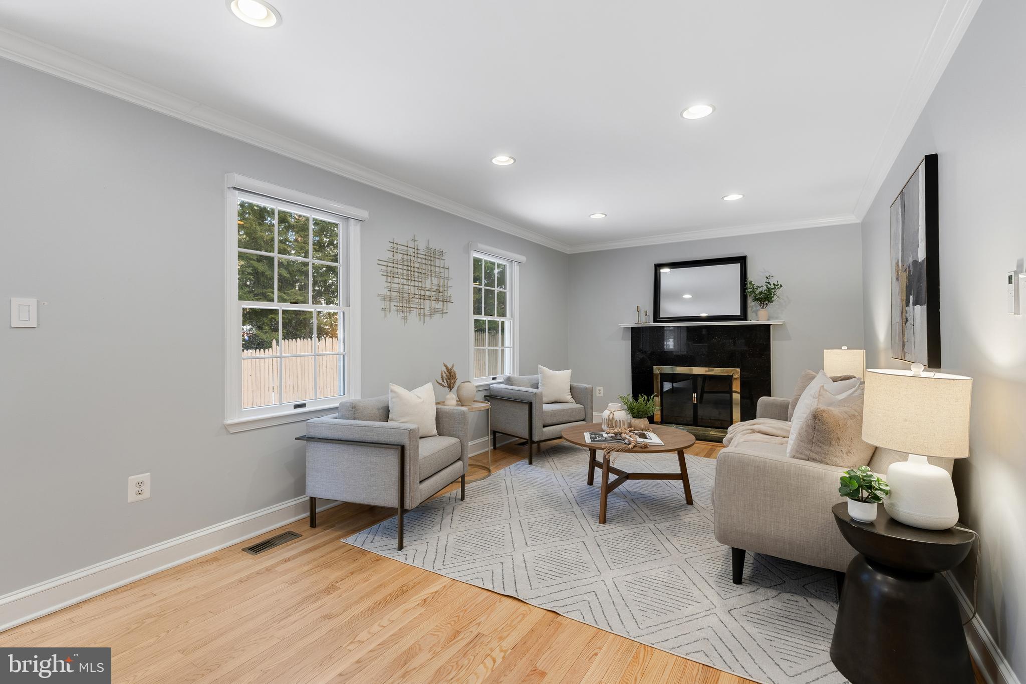 6443 Linway Terrace McLean, VA 22101 - Photo 16 of 53 a living room with furniture and a fireplace