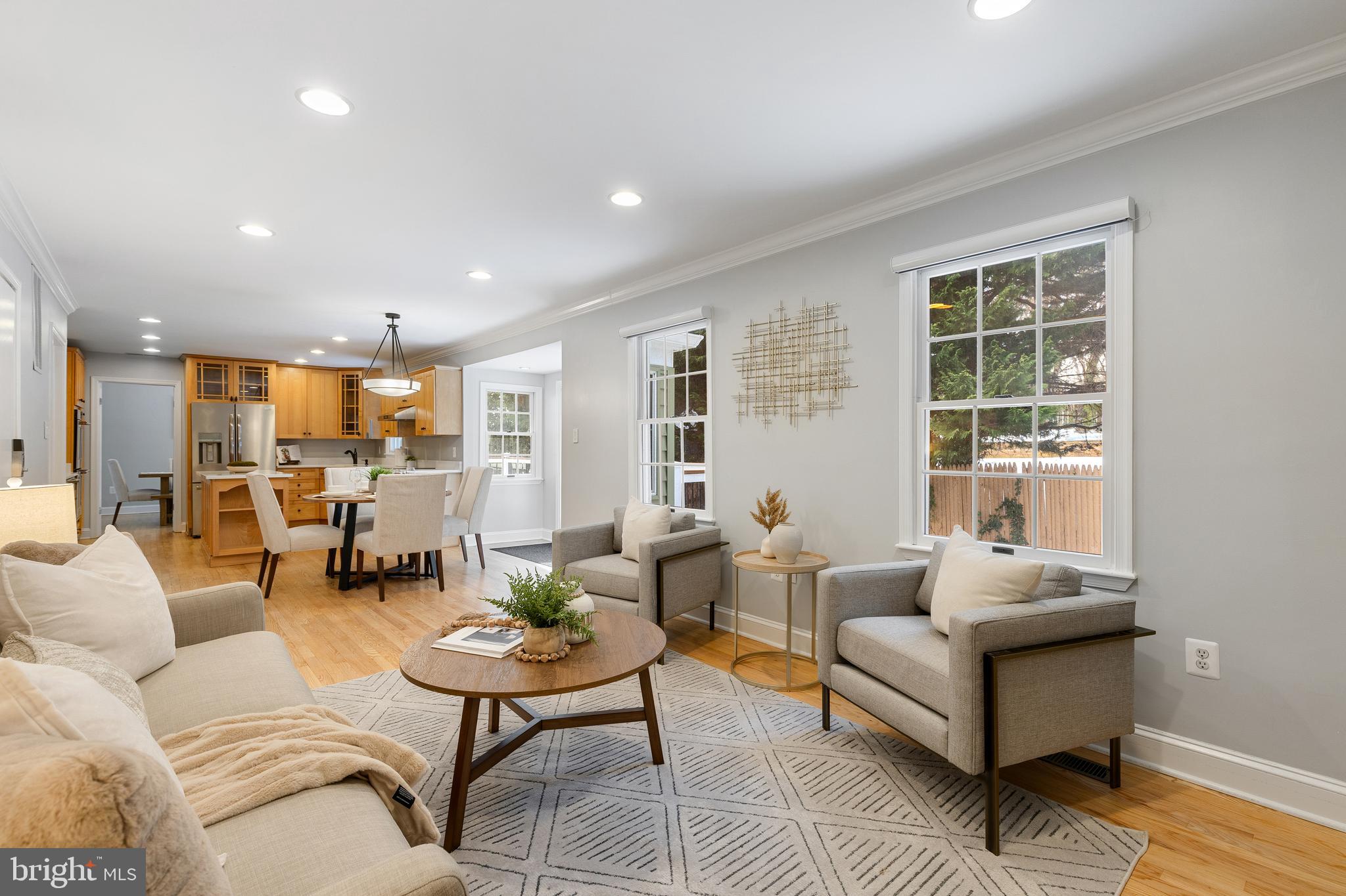 6443 Linway Terrace McLean, VA 22101 - Photo 18 of 53 a living room with furniture and a table