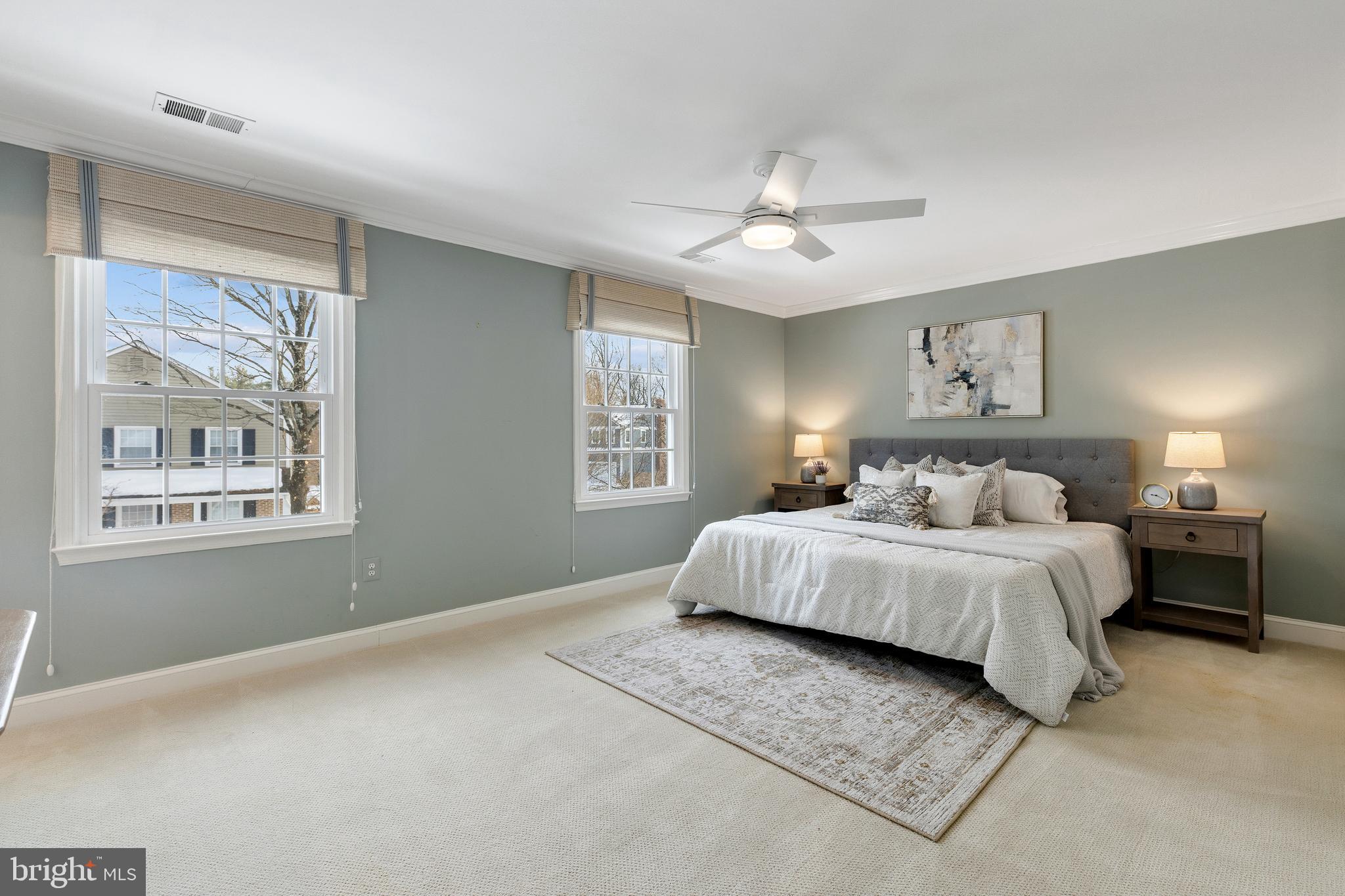 6443 Linway Terrace McLean, VA 22101 - Photo 20 of 53 a spacious bedroom with a large bed and a window