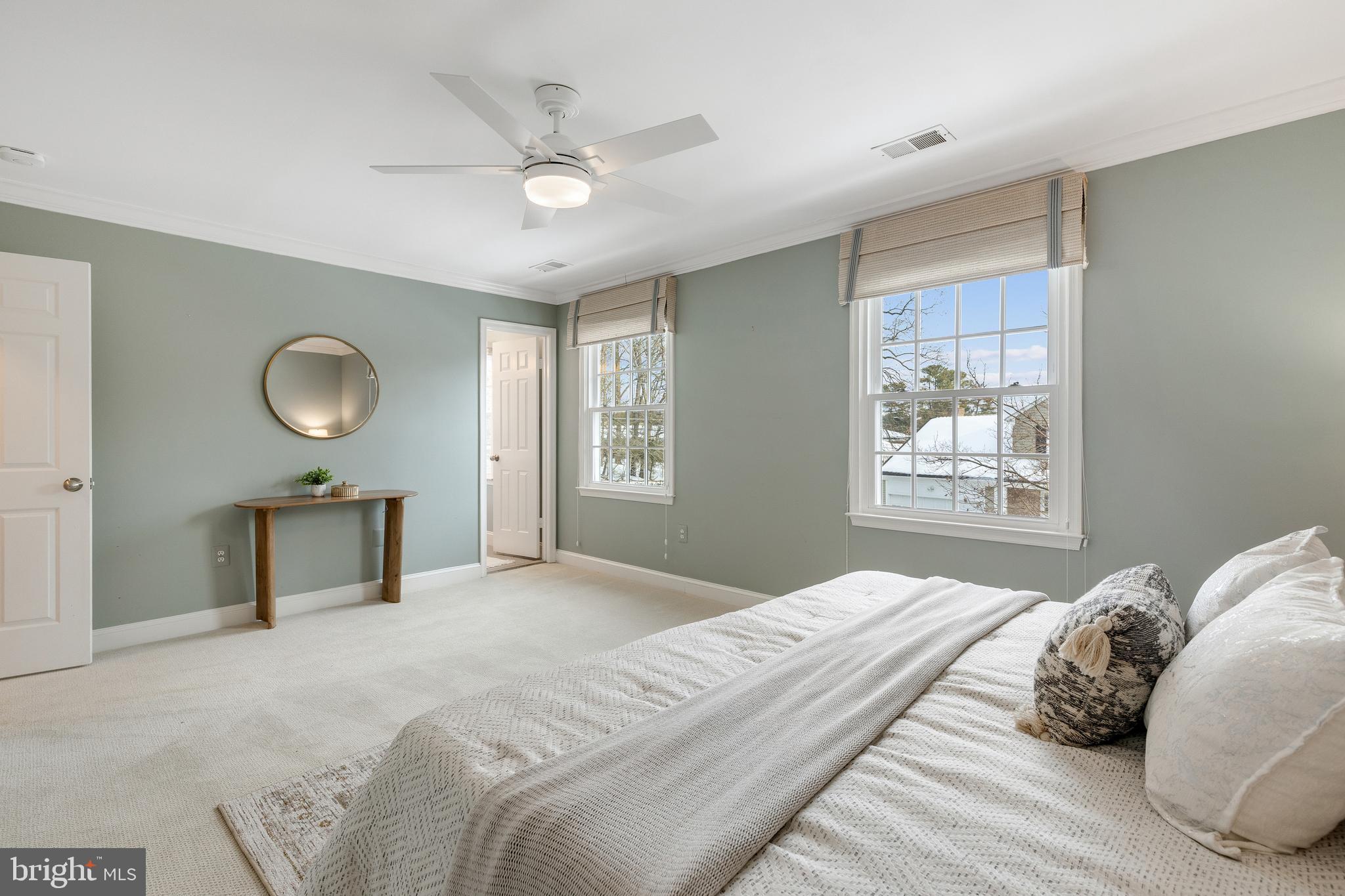6443 Linway Terrace McLean, VA 22101 - Photo 22 of 53 a bedroom with a large bed and a window