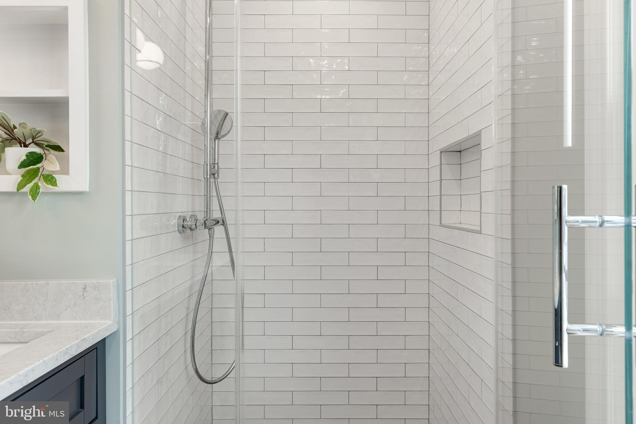 6443 Linway Terrace McLean, VA 22101 - Photo 24 of 53 a bathroom with a shower