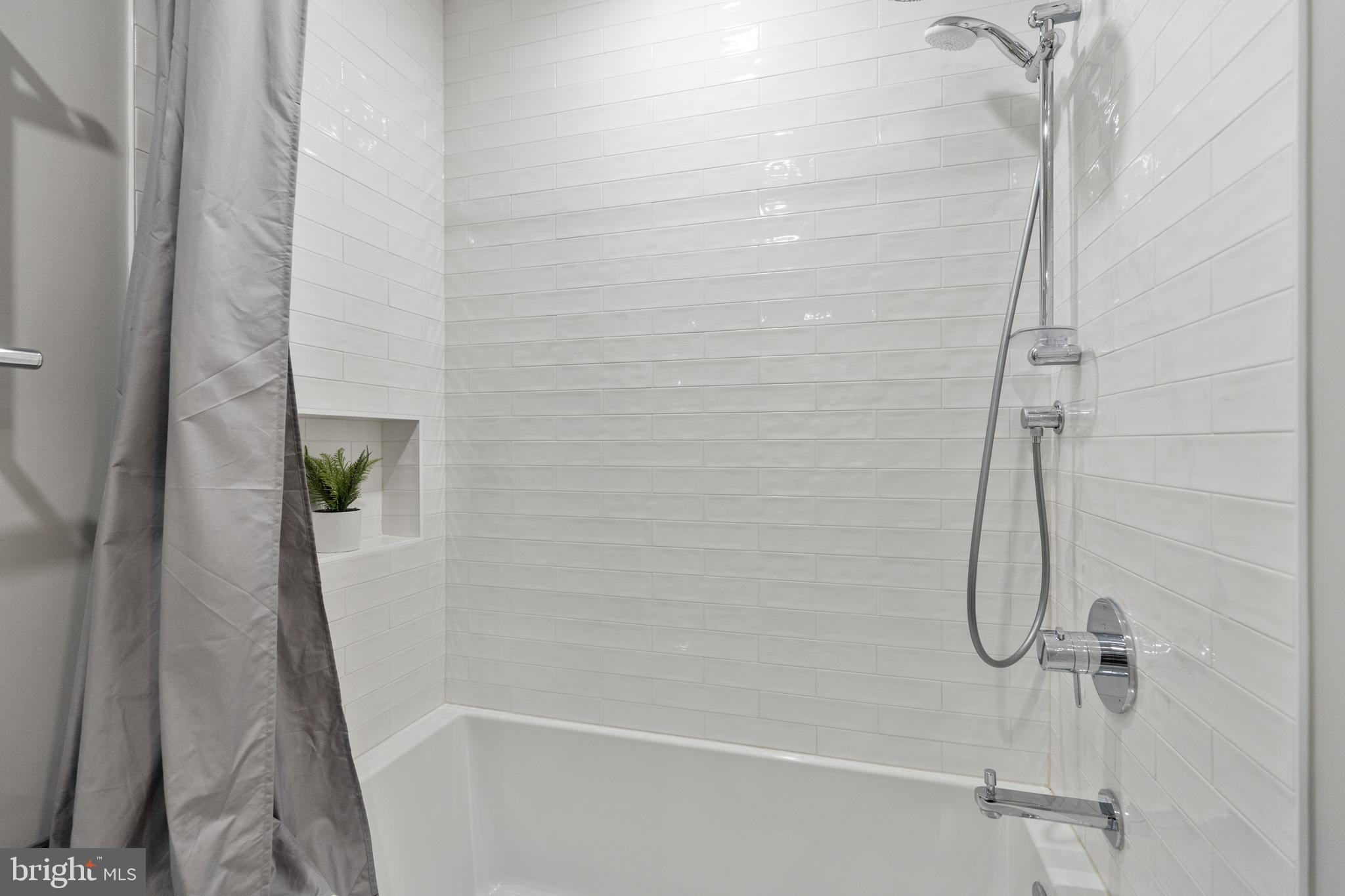 6443 Linway Terrace McLean, VA 22101 - Photo 28 of 53 a bathroom with a shower