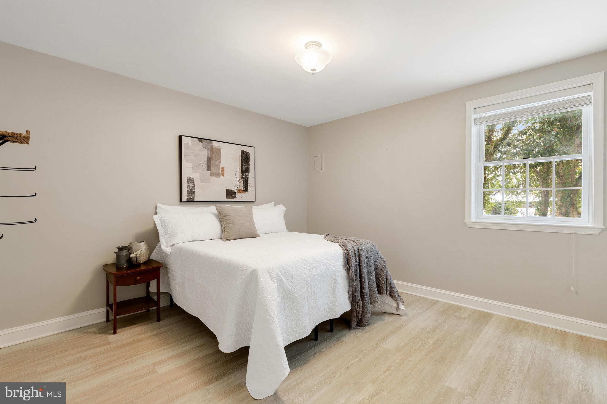 6443 Linway Terrace McLean, VA 22101 - Photo 33 of 53 a bedroom with a bed and a window