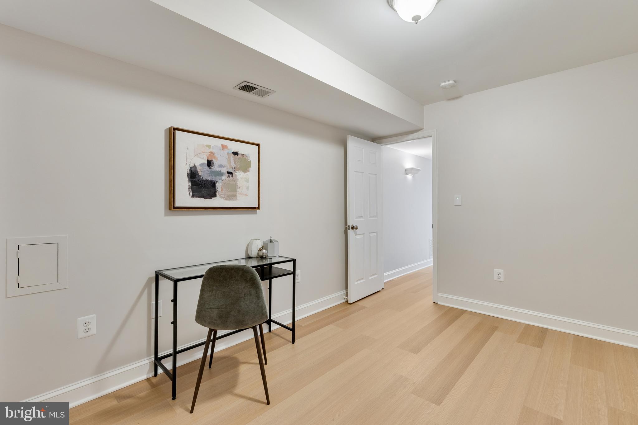 6443 Linway Terrace McLean, VA 22101 - Photo 37 of 53 a view of workspace with painting on the wall