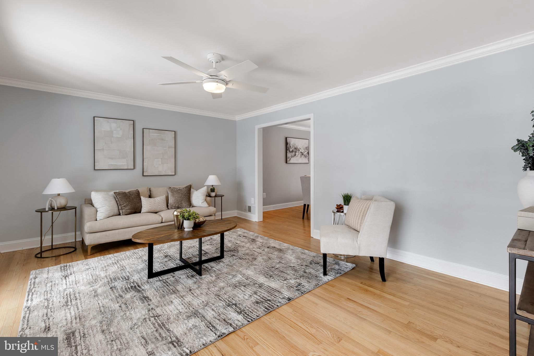 6443 Linway Terrace McLean, VA 22101 - Photo 5 of 53 a living room with furniture and a lamp