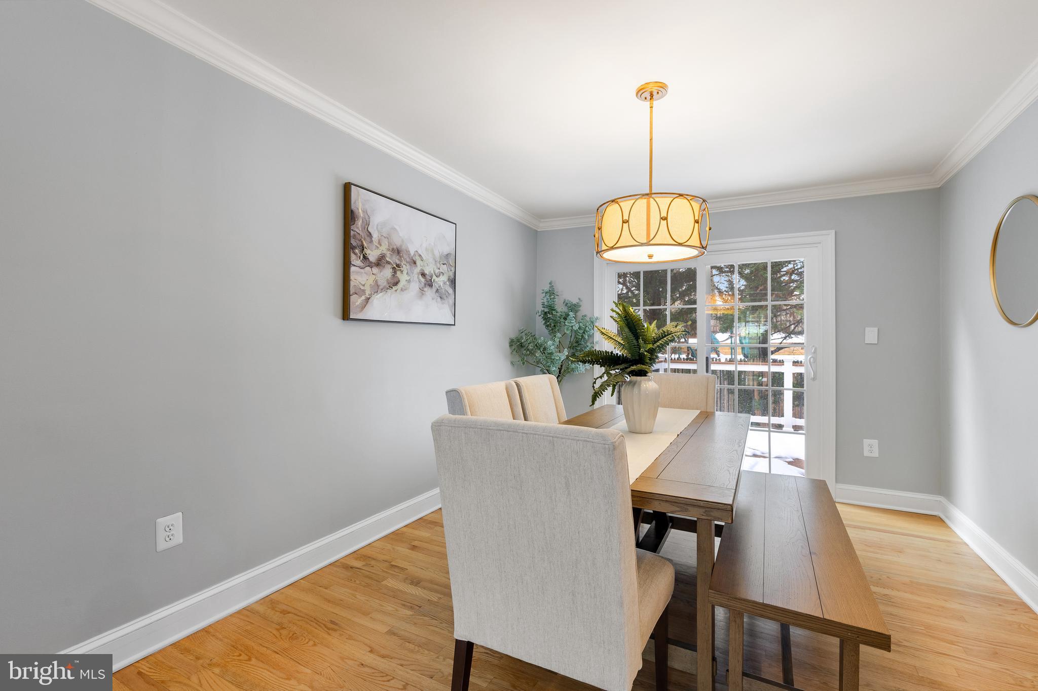 6443 Linway Terrace McLean, VA 22101 - Photo 7 of 53 a view of a dining room with furniture window and wooden floor