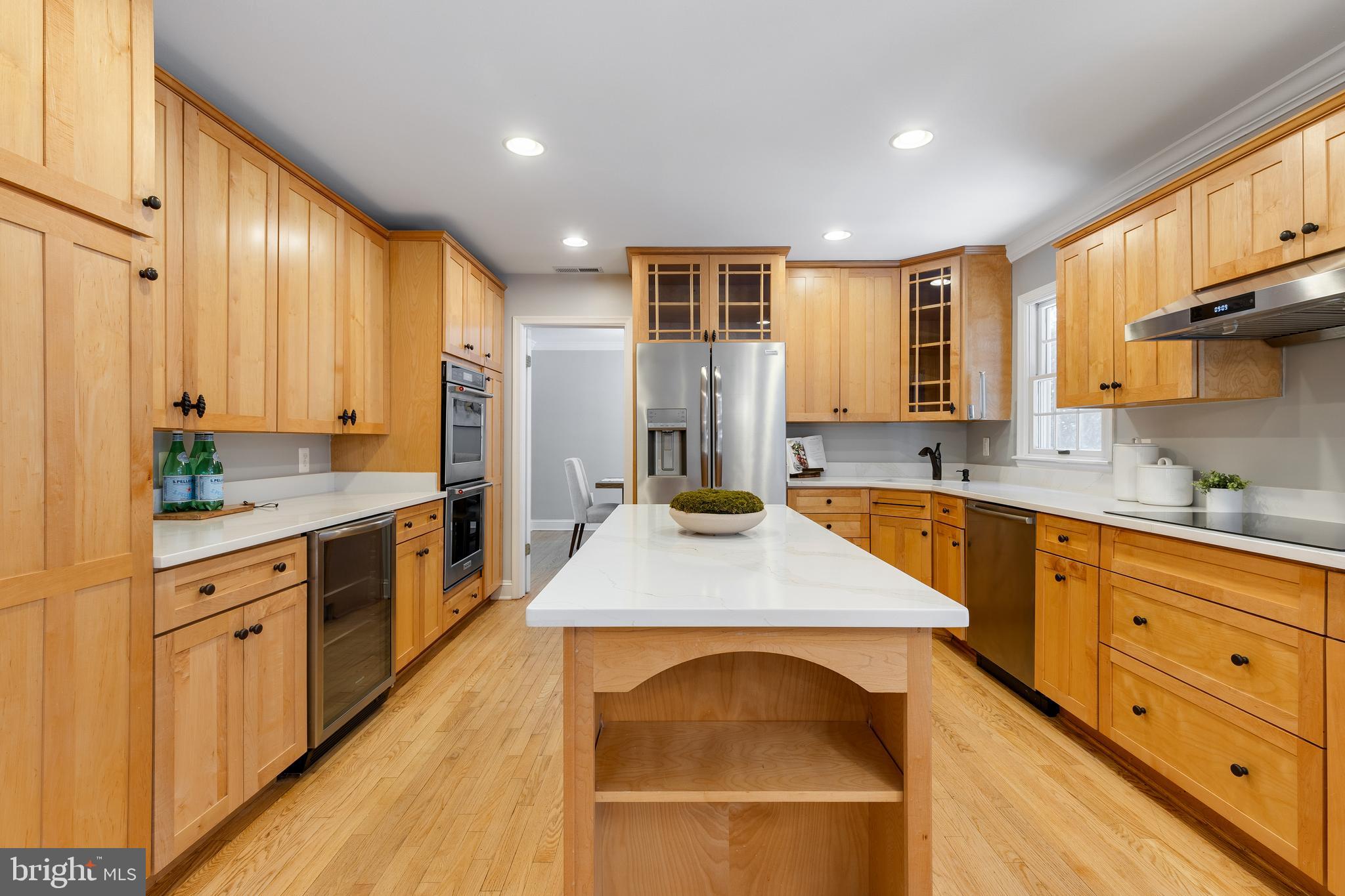 6443 Linway Terrace McLean, VA 22101 - Photo 10 of 53 a large kitchen with stainless steel appliances granite countertop a sink a stove a refrigerator and a cabinets