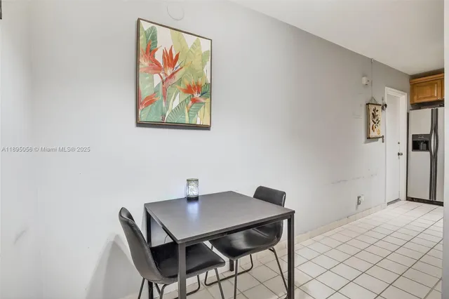 a view of a workspace with furniture