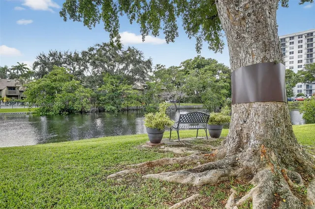 a backyard of a house with seating space