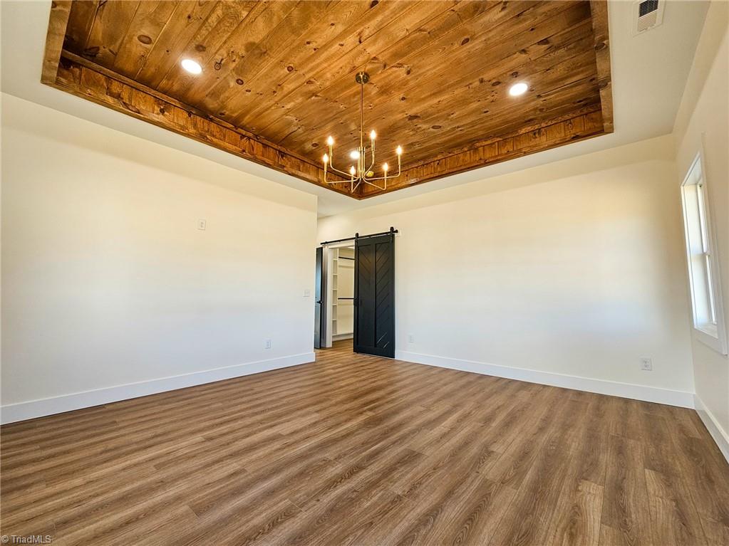 231 Viewmont Lane Ronda, NC 28670 - Photo 15 of 31 Gorgeous 10 ft tongue & groove tray ceilings in the master bedroom!